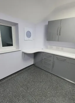 Air conditioning being maintained by a worker