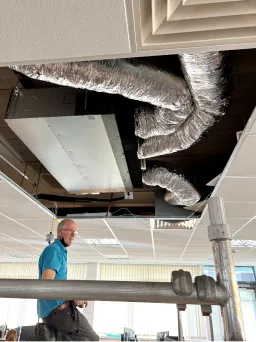 Man installing an air conditioning unit